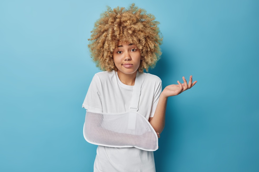 Woman Female Broken Arm Personal Injury Curly Hair