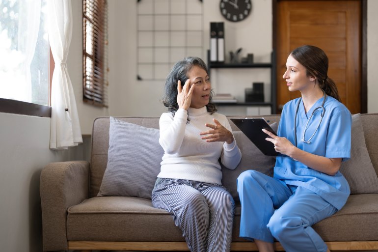 Nurse Senior Patient Sofa Assisting Helping Home