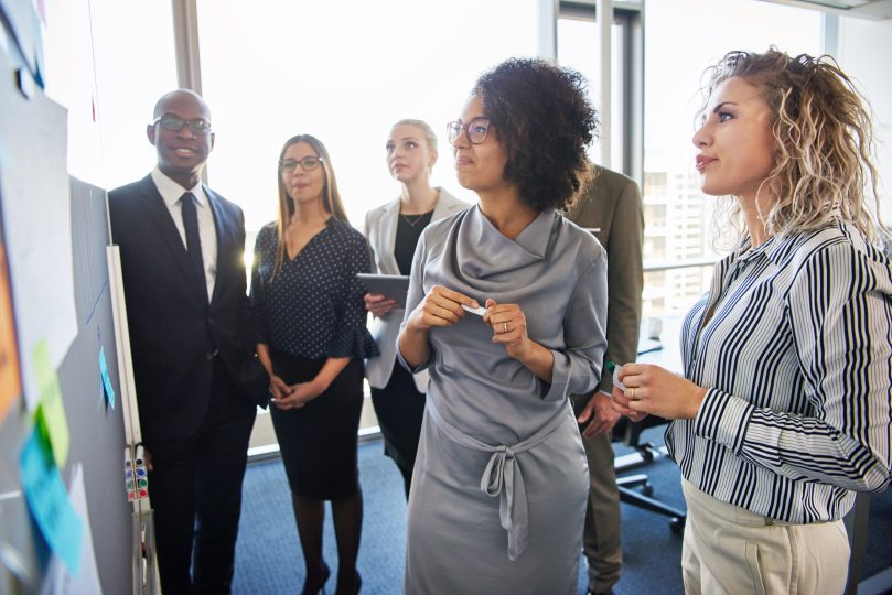 Identify Market Opportunities Team Colleagues Working on Strategy Strategic Thinking Planning