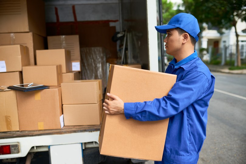 Man Loading Truck Cartons Boxes Male Shipping Road Supply Chain Logistics