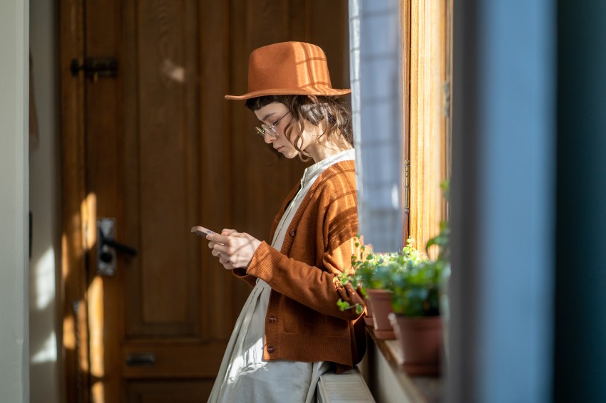 Young Woman Hipster Girl Using Smartphone Mobile Phone Apps