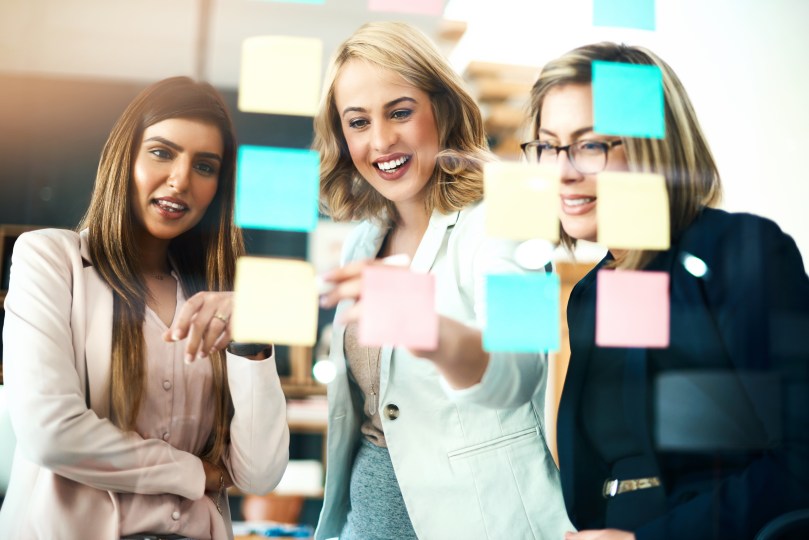 3 Three Women Working Project Management Post Its Transparent Board KanBan Scrum