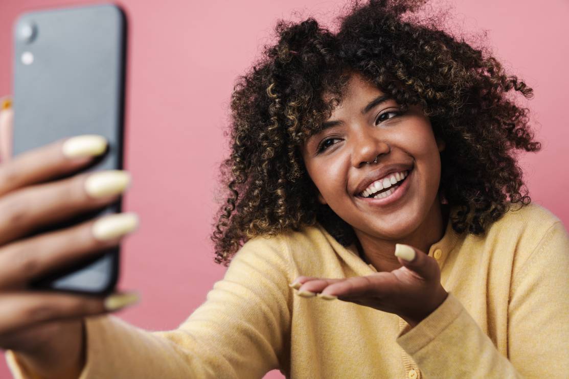 Woman doing video prospecting on her phone