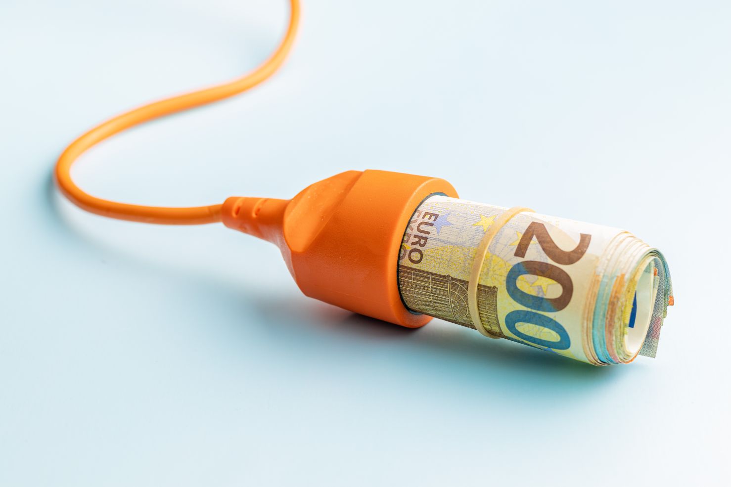 A socket and euro money on blue background depicting bought LinkedIn connections