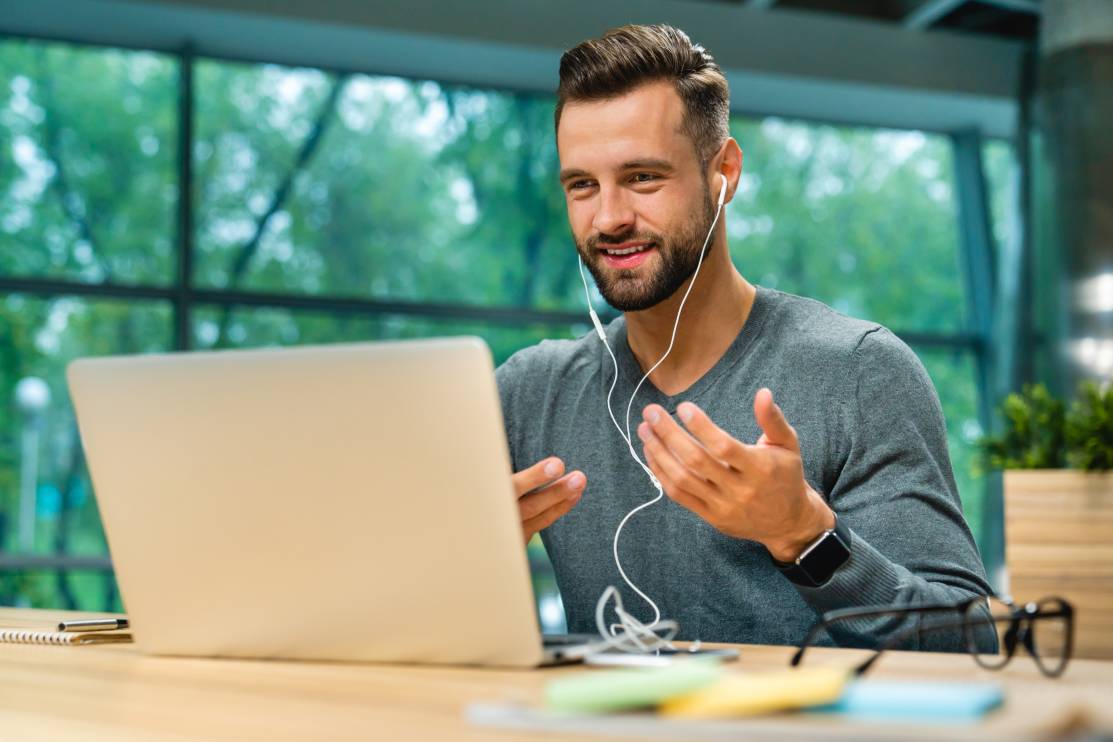 Businessman having online conversation and doing video prospecting