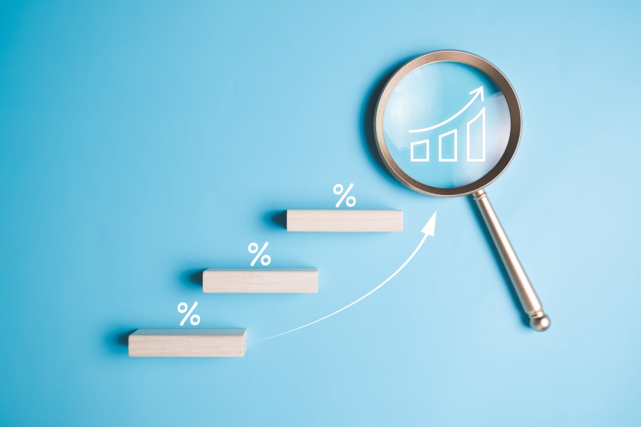 Revenue Growth Concept Percentage Curve Glass Magnifyer