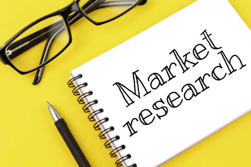 Market Research Concept Notepad Notebook Pen Glasses Yellow