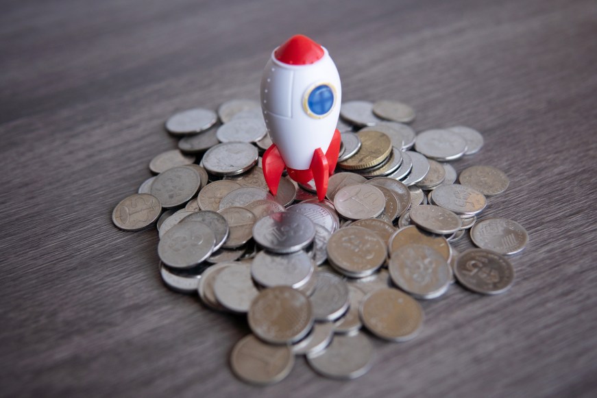 Startup Funding Concept Cash Flow Coins Rocket