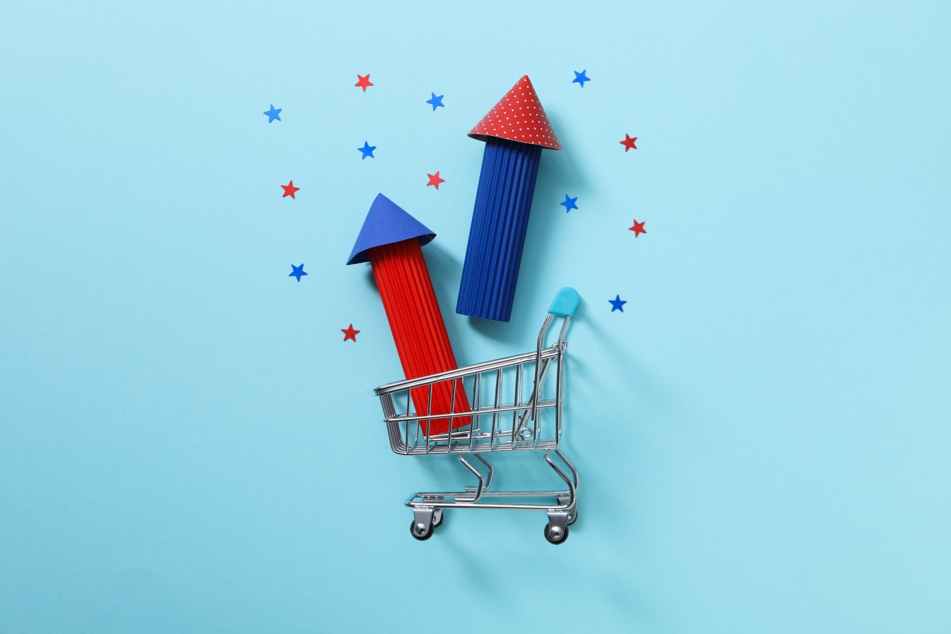 Fireworks depiction and a pushcart showing increasing sales