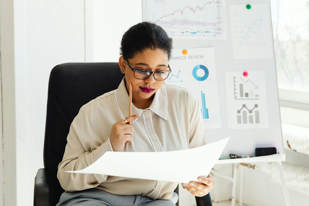 Woman looking over data-driven insights generated by TikTok Shop Creator