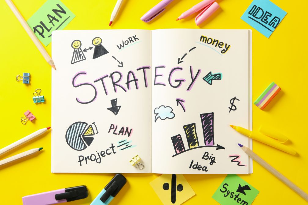 Concept of business strategy on yellow background