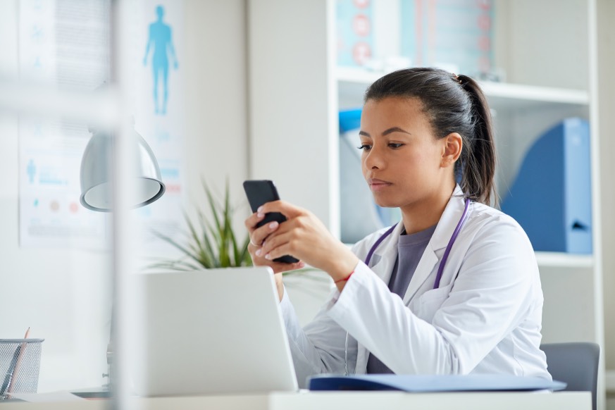 Female Plastic Surgeon Using Mobile Phone Smartphone